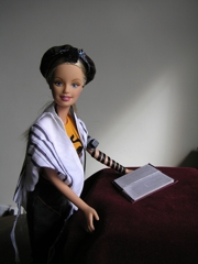 Barbie leading daf-yomi shiur, for all the wailing winnies who didn't like the Steinsaltz. Barbie is hardcore, see? She's taking daf-yomi shiur before minyan starts, telling you that she's sorry you don't get that Tosafot but we don't have time to get into it right now and she'll go through it with you if you can stay afterwards. 
